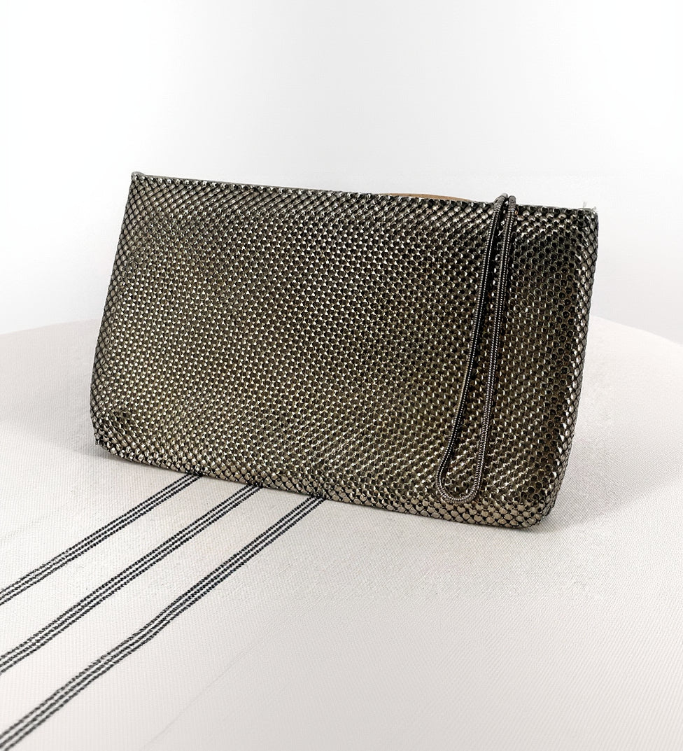 Textured clutch bag on a white background