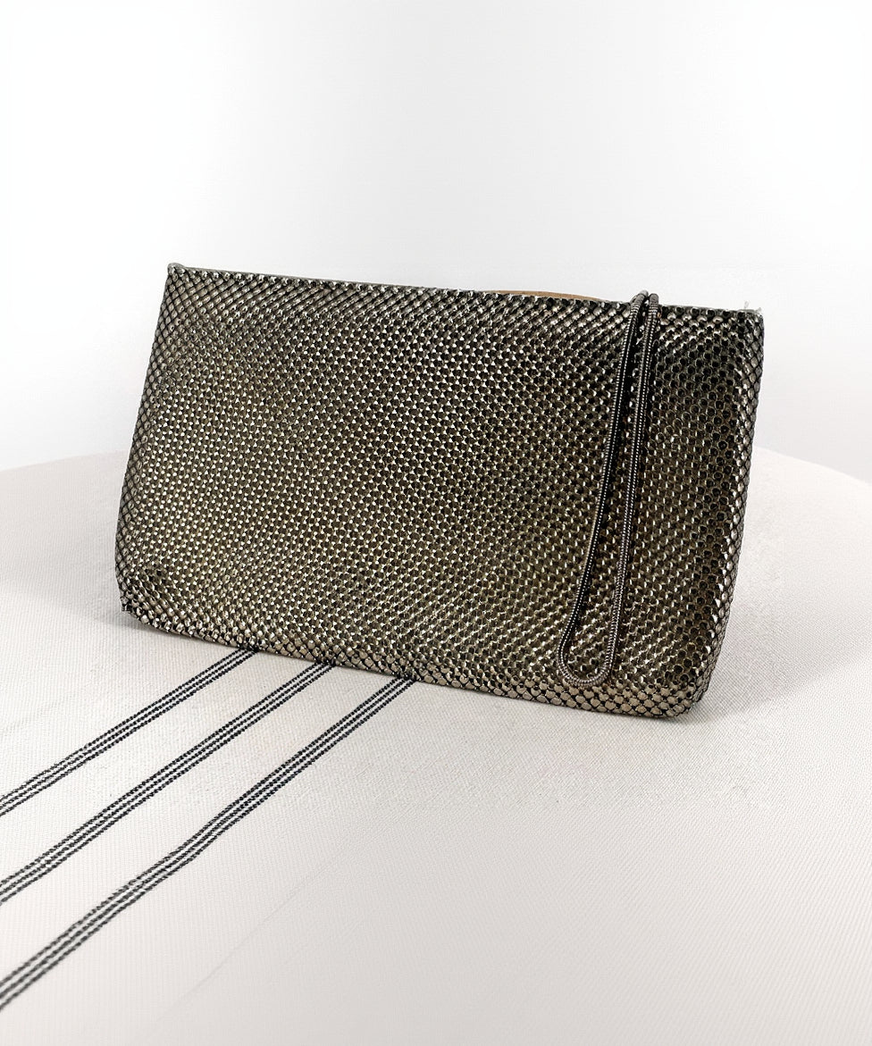 Textured clutch bag on a white background