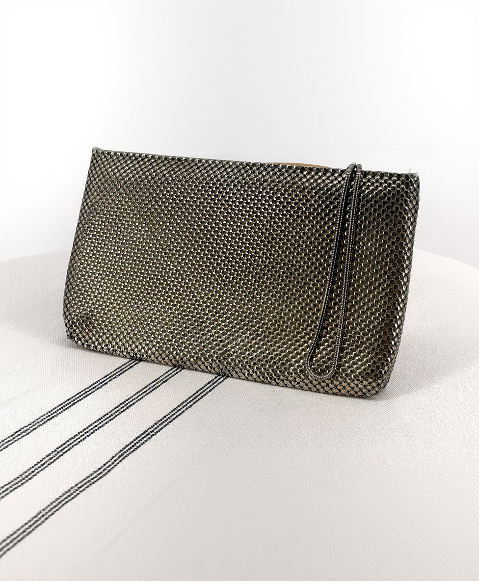 Textured clutch bag on a white background